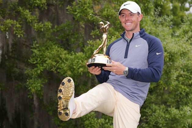 PONTE VEDRA BEACH, FLORIDA - MARCH 17:  Rory McIlroy of Northern Ireland shows how the sole of his shoes matches the winner's trophy after winning The PLAYERS Championship on The Stadium Course at TPC Sawgrass on March 17, 2019 in Ponte Vedra Beach, Florida. (Photo by Richard Heathcote/Getty Images)