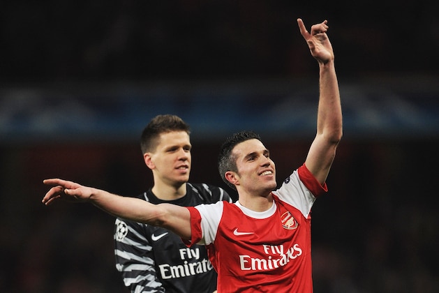 LONDON, ENGLAND - FEBRUARY 16:  Robin van Persie of Arsenal celebrates victory with Wojciech Szczesny after the UEFA Champions League round of 16 first leg match between Arsenal and Barcelona at the Emirates Stadium on February 16, 2011 in London, England.  (Photo by Jasper Juinen/Getty Images)