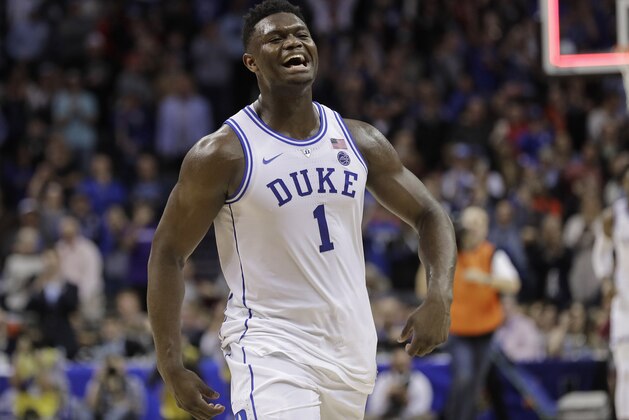 Duke's Zion Williamson (1) celebrates after Duke defeated Florida State in the NCAA college basketball championship game of the Atlantic Coast Conference tournament in Charlotte, N.C., Saturday, March 16, 2019. (AP Photo/Nell Redmond)