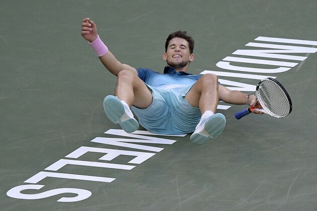Dominic Thiem, of Austria, celebrates after defeating Roger Federer, of Switzerland, in the men's final at the BNP Paribas Open tennis tournament Sunday, March 17, 2019, in Indian Wells, Calif. Thiem won 3-6, 6-3, 7-5. (AP Photo/Mark J. Terrill)