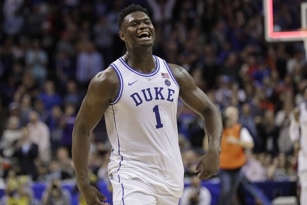 Duke's Zion Williamson (1) celebrates after Duke defeated Florida State in the NCAA college basketball championship game of the Atlantic Coast Conference tournament in Charlotte, N.C., Saturday, March 16, 2019. (AP Photo/Nell Redmond)