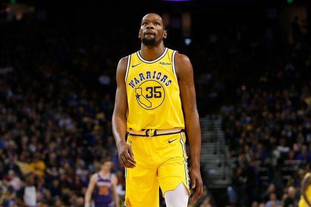 OAKLAND, CA - MARCH 10: Kevin Durant #35 of the Golden State Warriors looks on during the game against the Phoenix Suns at ORACLE Arena on March 10, 2019 in Oakland, California. NOTE TO USER: User expressly acknowledges and agrees that, by downloading and or using this photograph, User is consenting to the terms and conditions of the Getty Images License Agreement. (Photo by Lachlan Cunningham/Getty Images)