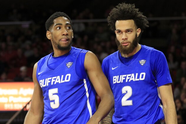 OXFORD, OHIO - MARCH 01: CJ Massinburg #5 and Jeremy Harris #2 of the Buffalo Bulls reacts after a play in the game against the Miami (Oh) Redhawks at Millett Hall on March 01, 2019 in Oxford, Ohio. (Photo by Justin Casterline/Getty Images)
