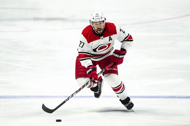 NASHVILLE, TN - MARCH 9:  Justin Faulk #27 of the Carolina Hurricanes skates against the Nashville Predators at Bridgestone Arena on March 9, 2019 in Nashville, Tennessee.  (Photo by Ronald C. Modra/NHL/Getty Images)
