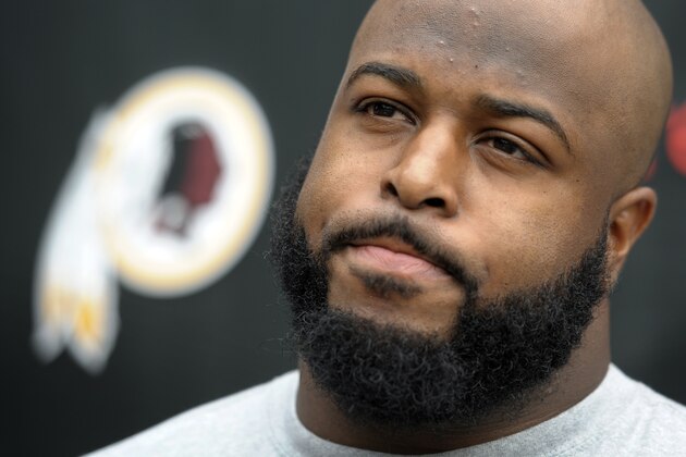 Washington Redskin defensive lineman Barry Cofield speaks with reporters during their NFL training camp at Redskins Park in Ashburn, Va., Saturday, July 28, 2012. (AP Photo/Cliff Owen)