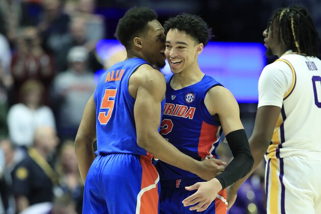 NASHVILLE, TENNESSEE - MARCH 15:  Andrew Nembhard #2 of the Florida Gators celebrates with KeVaughn Allen #5 in the game against the LSU Tigers during the Quarterfinals of the SEC Basketball Tournament at Bridgestone Arena on March 15, 2019 in Nashville, Tennessee. (Photo by Andy Lyons/Getty Images)