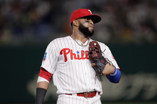 TOKYO, JAPAN - NOVEMBER 10: Infielder Carlos Santana #41 of the Philadelhia Phillies  reacts after a throwing error by Enrique Hernandez #14 of the Los Angeles Dodgers in the top of 5th inning during the game two of the Japan and MLB All Stars at Tokyo Dome on November 10, 2018 in Tokyo, Japan.  (Photo by Kiyoshi Ota/Getty Images)