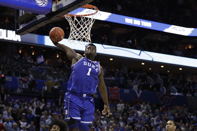 Duke's Zion Williamson (1) dunks against North Carolina during the second half of an NCAA college basketball game in the Atlantic Coast Conference tournament in Charlotte, N.C., Friday, March 15, 2019. (AP Photo/Nell Redmond)
