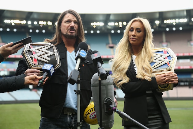MELBOURNE, AUSTRALIA - JUNE 24:  WWE'S world champion AJ Styles and Smackdown women's champion Carmella speak at the Melbourne Cricket Ground on June 24, 2018 in Melbourne, Australia.  (Photo by Robert Prezioso/Getty Images)