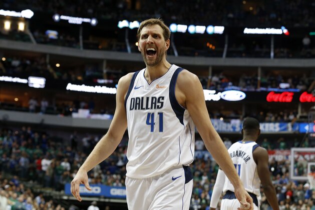Dallas Mavericks forward Dirk Nowitzki argues a foul call during the second half of the team's NBA basketball game against the Cleveland Cavaliers in Dallas, Saturday, March 16, 2019. (AP Photo/Michael Ainsworth)