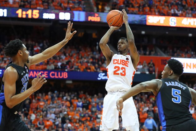 SYRACUSE, NY - FEBRUARY 23:  Frank Howard #23 of the Syracuse Orange shoots the ball between Marques Bolden #20 and RJ Barrett #5 of the Duke Blue Devils during the second half at the Carrier Dome on February 23, 2019 in Syracuse, New York. Duke defeated Syracuse 75-65. (Photo by Rich Barnes/Getty Images)