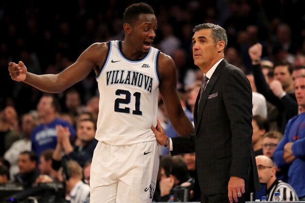 NEW YORK, NEW YORK - MARCH 16:  Dhamir Cosby-Roundtree #21 of the Villanova Wildcats talks with head coach Jay Wright in the second half against the Seton Hall Pirates during the Big East Championship Game at Madison Square Garden on March 16, 2019 in New York City. (Photo by Elsa/Getty Images)