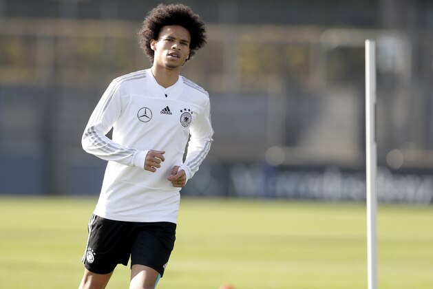 Player Leroy Sane runs during a training session of the German national soccer team in Berlin, Germany, Wednesday, Oct. 10, 2018. Germany will face the team of the Netherlands for a UEFA Nations League match in Amsterdam on Saturday, Oct. 13, 2018. (AP Photo/Michael Sohn)