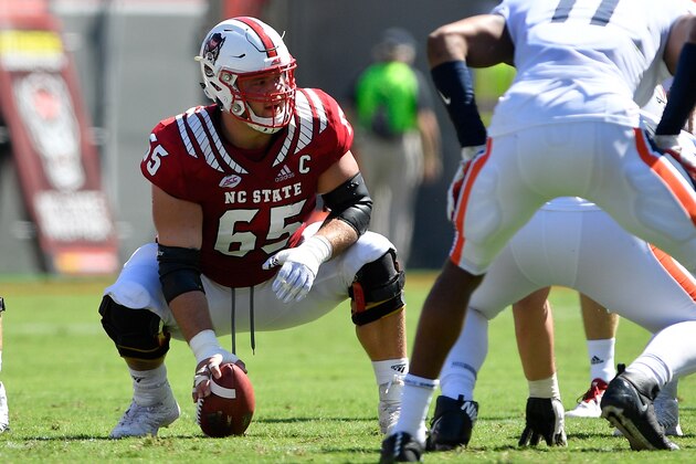 RALEIGH, NC - SEPTEMBER 29: Garrett Bradbury #65 of the North Carolina State Wolfpack prepares to snap the ball against the Virginia Cavaliers at Carter-Finley Stadium on September 29, 2018 in Raleigh, North Carolina. NC State won 35-21. (Photo by Lance King/Getty Images)