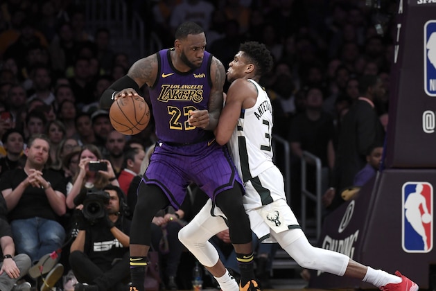LOS ANGELES, CALIFORNIA - MARCH 01: LeBron James #23 of the Los Angeles Lakers is guraded by Giannis Antetokounmpo #34 of the Milwaukee Bucks during the game at Staples Center on March 01, 2019 in Los Angeles, California. NOTE TO USER: User expressly acknowledges and agrees that, by downloading and or using this photograph, User is consenting to the terms and conditions of the Getty Images License Agreement.  (Photo by Kevork Djansezian/Getty Images)