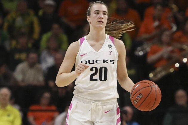 Oregon's Sabrina Ionescu (20) dribbles up the court during the first half of an NCAA college basketball game against Oregon State in Corvallis, Ore., Monday, Feb. 18, 2019. Oregon State won 67-62. (AP Photo/Amanda Loman)