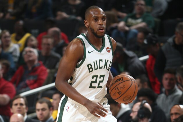 MILWAUKEE, WI - MARCH 19:  Khris Middleton #22 of the Milwaukee Bucks handles the ball against the Los Angeles Lakers on March 19, 2019 at the Fiserv Forum Center in Milwaukee, Wisconsin. NOTE TO USER: User expressly acknowledges and agrees that, by downloading and or using this Photograph, user is consenting to the terms and conditions of the Getty Images License Agreement. Mandatory Copyright Notice: Copyright 2019 NBAE (Photo by Nathaniel S. Butler/NBAE via Getty Images).
