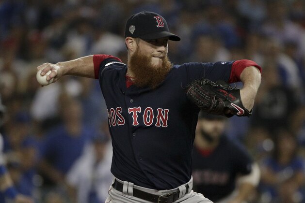 Boston Red Sox relief pitcher Craig Kimbrel throws against the Los Angeles Dodgers during the ninth inning in Game 3 of the World Series baseball game on Friday, Oct. 26, 2018, in Los Angeles. (AP Photo/Jae C. Hong)