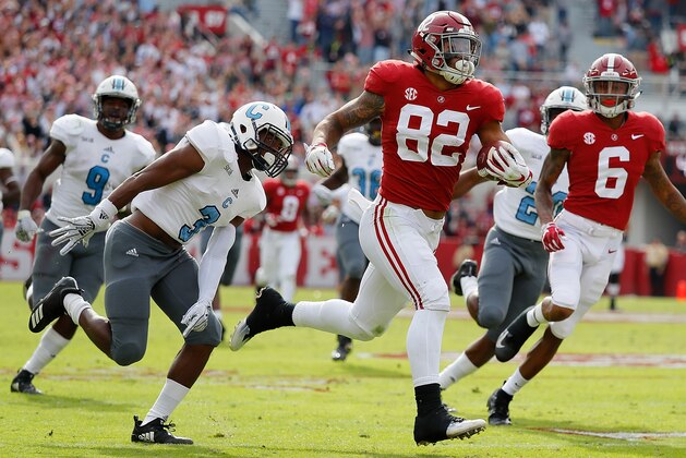 TUSCALOOSA, AL - NOVEMBER 17:  Irv Smith Jr. #82 of the Alabama Crimson Tide breaks away with a reception on the way to a touchdown against Joshua Bowers #3 of the Citadel Bulldogs at Bryant-Denny Stadium on November 17, 2018 in Tuscaloosa, Alabama.  (Photo by Kevin C. Cox/Getty Images)