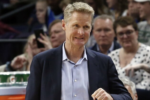 Golden State Warriors head coach Steve Kerr directs his team against the Minnesota Timberwolves in the second half of an NBA basketball game Tuesday, March 19, 2019, in Minneapolis. The Warriors won 117-107. (AP Photo/Jim Mone)