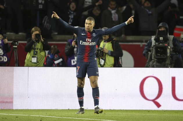 PARIS, FRANCE - MARCH 17: Kylian Mbappe of PSG celebrates his goal during the French Ligue 1 match between Paris Saint-Germain (PSG) and Olympique de Marseille (OM) at Parc des Princes stadium on March 17, 2019 in Paris, France. (Photo by Jean Catuffe/Getty Images)