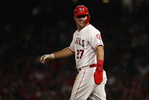 ANAHEIM, CA - SEPTEMBER 28: Mike Trout #27 of the Los Angeles Angels of Anaheim looks to the Angels dugout as Trout walks back to second base during the fifth inning of the MLB game against the Oakland Athletics at Angel Stadium on September 28, 2018 in Anaheim, California. The Angels defeated the Athletics 8-5.  (Photo by Victor Decolongon/Getty Images)