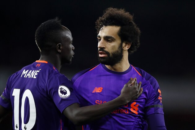 LONDON, ENGLAND - NOVEMBER 03:  Sadio Mane of Liverpool and Mohamed Salah of Liverpool look on during the Premier League match between Arsenal FC and Liverpool FC at Emirates Stadium on November 3, 2018 in London, United Kingdom.  (Photo by Julian Finney/Getty Images)