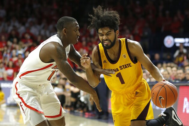 Arizona State guard Remy Martin, right, drives on Arizona guard Justin Coleman, left, in the first half during an NCAA college basketball game, Saturday, March 9, 2019, in Tucson, Ariz. (AP Photo/Rick Scuteri)