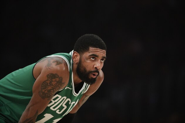 Boston Celtics' Kyrie Irving pauses during the first half of an NBA basketball game against the Los Angeles Lakers, Saturday, March 9, 2019, in Los Angeles. (AP Photo/Jae C. Hong)