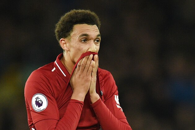 Liverpool's English defender Trent Alexander-Arnold reacts after drawing the English Premier League football match between Everton and Liverpool at Goodison Park in Liverpool, north west England on March 3, 2019. (Photo by Oli SCARFF / AFP) / RESTRICTED TO EDITORIAL USE. No use with unauthorized audio, video, data, fixture lists, club/league logos or 'live' services. Online in-match use limited to 120 images. An additional 40 images may be used in extra time. No video emulation. Social media in-match use limited to 120 images. An additional 40 images may be used in extra time. No use in betting publications, games or single club/league/player publications. /         (Photo credit should read OLI SCARFF/AFP/Getty Images)