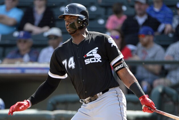 SURPRISE, ARIZONA - MARCH 01:  Eloy Jimenez #74 of the Chicago White Sox bats against the Texas Rangers on March 1, 2019 at Billy Parker Field at Surprise Stadium in Surprise Arizona.  (Photo by Ron Vesely/MLB Photos via Getty Images)