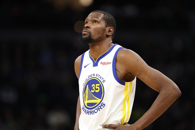 MINNEAPOLIS, MN - MARCH 19: Kevin Durant #35 of the Golden State Warriors looks on during the game against the Minnesota Timberwolves on March 19, 2019 at Target Center in Minneapolis, Minnesota. NOTE TO USER: User expressly acknowledges and agrees that, by downloading and/or using this photograph, user is consenting to the terms and conditions of the Getty Images License Agreement. Mandatory Copyright Notice: Copyright 2019 NBAE (Photo by Jordan Johnson/NBAE via Getty Images)