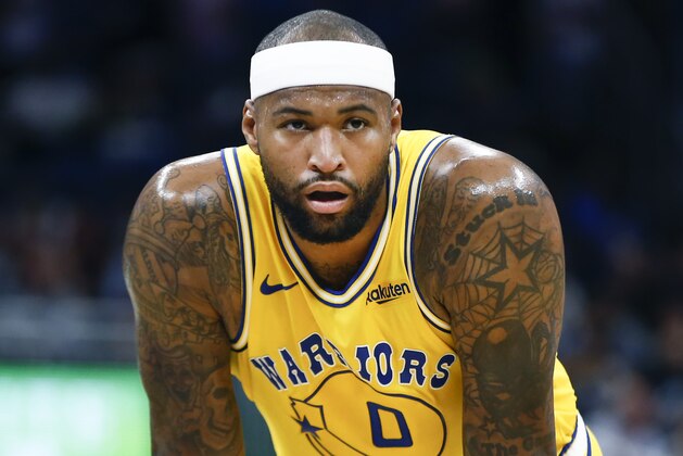 Golden State Warriors center DeMarcus Cousins waits on the ball to come into play during the first quarter of an NBA basketball game against the Orlando Magic in Orlando, Fla., on Thursday, Feb. 28, 2019. (AP Photo/Reinhold Matay)
