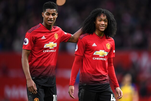 MANCHESTER, ENGLAND - MARCH 02: Marcus Rashford of Manchster United  celebrates victory with Tahith Chong of Manchester United after the Premier League match between Manchester United and Southampton FC at Old Trafford on March 02, 2019 in Manchester, United Kingdom. (Photo by Shaun Botterill/Getty Images)
