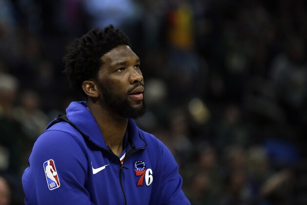 Philadelphia 76ers' Joel Embiid warms up before an NBA basketball game against the Milwaukee Bucks Sunday, March 17, 2019, in Milwaukee. (AP Photo/Aaron Gash)