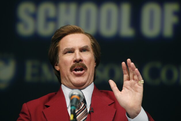 Actor and comedian Will Ferrell, who plays TV anchorman Ron Burgundy, stays in character and speaks during a news conference at Emerson College in Boston, Wednesday, Dec. 4, 2013. The school has changed the name of its School of Communication for one day to honor the fictitious television anchorman. (AP Photo/Elise Amendola)