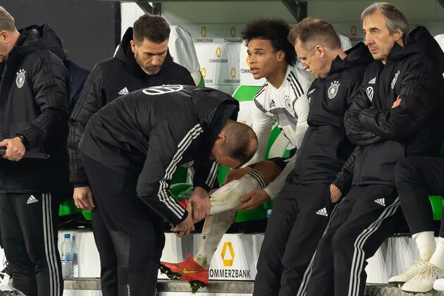 WOLFSBURG, GERMANY - MARCH 20: Leroy Sane of Germany injured during the International Friendly match between Germany and Serbia at Volkswagen Arena on March 20, 2019 in Wolfsburg, Germany. (Photo by TF-Images/Getty Images)