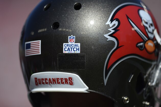 Crucial Catch sticker on a Tampa Bay Buccaneers helmet during the first half of an NFL football game against the Cleveland Browns Sunday, Oct. 21, 2018, in Tampa, Fla. (AP Photo/Jason Behnken)