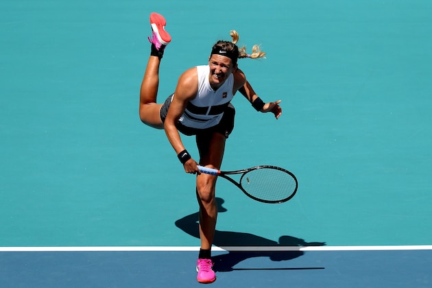 MIAMI GARDENS, FLORIDA - MARCH 20: Victoria Azarenka of Belarus serves to Dominika Cibulkova of Slovakia during the Miami Open Presented by Itau at Hard Rock Stadium March 20, 2019 in Miami Gardens, Florida. (Photo by Matthew Stockman/Getty Images)
