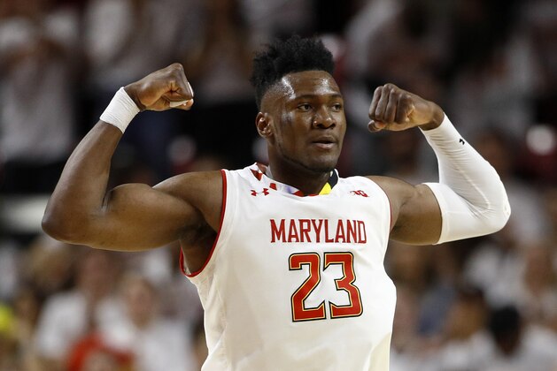 Maryland forward Bruno Fernando, of Angola, gestures after scoring in the second half of an NCAA college basketball game against Ohio State, Saturday, Feb. 23, 2019, in College Park, Md. Maryland won 72-62. (AP Photo/Patrick Semansky)
