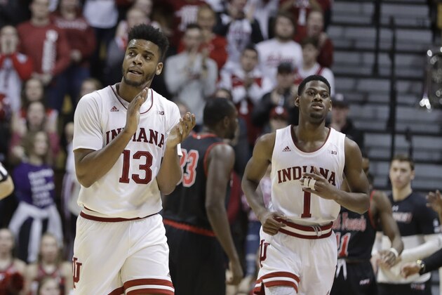 Indiana's Juwan Morgan (13) and Aljami Durham (1) react during the second half of an NCAA college basketball game in the first round of the NIT tournament against Saint Francis, Tuesday, March 19, 2019, in Bloomington, Ind. Indiana won 89-72. (AP Photo/Darron Cummings)