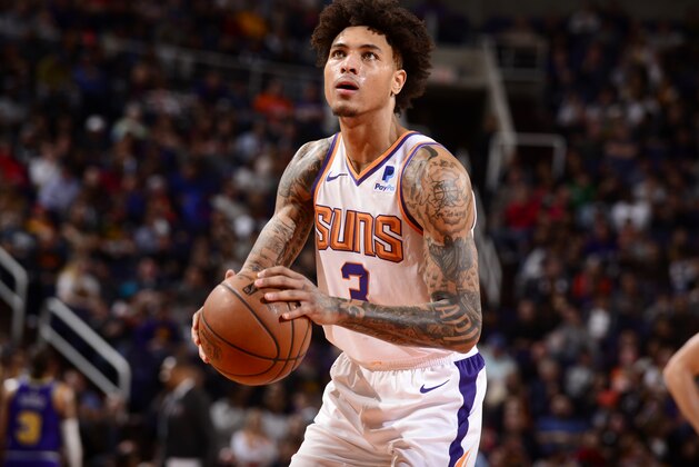 PHOENIX, AZ - MARCH 13: Kelly Oubre Jr. #3 of the Phoenix Suns shoots a free throw against the Utah Jazz on March 13, 2019 at Talking Stick Resort Arena in Phoenix, Arizona. NOTE TO USER: User expressly acknowledges and agrees that, by downloading and or using this photograph, user is consenting to the terms and conditions of the Getty Images License Agreement. Mandatory Copyright Notice: Copyright 2019 NBAE (Photo by Barry Gossage/NBAE via Getty Images)