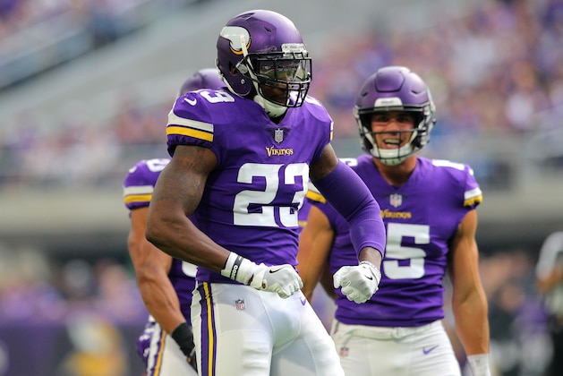 MINNEAPOLIS, MN - OCTOBER 14: George Iloka #23 of the Minnesota Vikings celebrates after making a tackle in the third quarter of the game against the Arizona Cardinals at U.S. Bank Stadium on October 14, 2018 in Minneapolis, Minnesota. (Photo by Adam Bettcher/Getty Images)