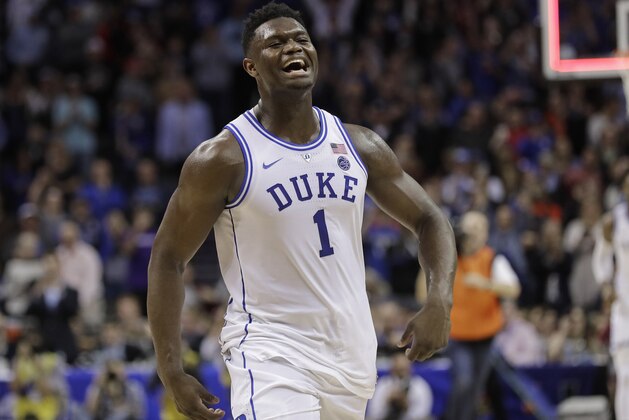 Duke's Zion Williamson (1) celebrates after Duke defeated Florida State in the NCAA college basketball championship game of the Atlantic Coast Conference tournament in Charlotte, N.C., Saturday, March 16, 2019. (AP Photo/Nell Redmond)