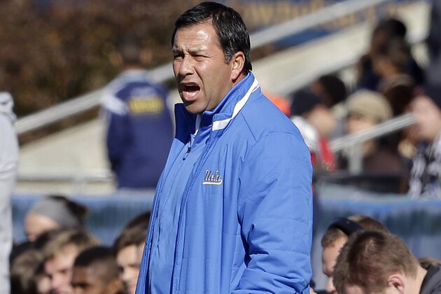UCLA coach Jorge Salcedo reacts during the first half of an NCAA College Cup championship soccer game against Virginia in Cary, N.C., Sunday, Dec. 14, 2014. (AP Photo/Gerry Broome)