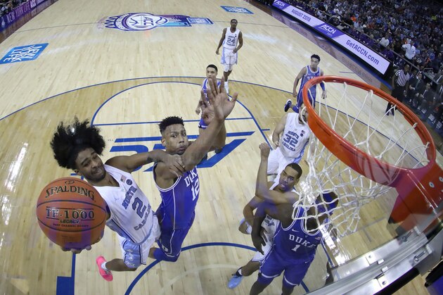 CHARLOTTE, NORTH CAROLINA - MARCH 15: Coby White #2 of the North Carolina Tar Heels drives to the basket against the Duke Blue Devils during their game in the semifinals of the 2019 Men's ACC Basketball Tournament at Spectrum Center on March 15, 2019 in Charlotte, North Carolina.  (Photo by Streeter Lecka/Getty Images)