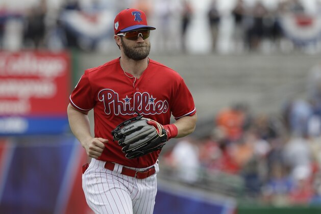 Philadelphia Phillies right fielder Bryce Harper runs to the dugout during the second inning of a spring training baseball game against the Detroit Tigers Wednesday, March 20, 2019, in Clearwater, Fla. (AP Photo/Chris O'Meara)