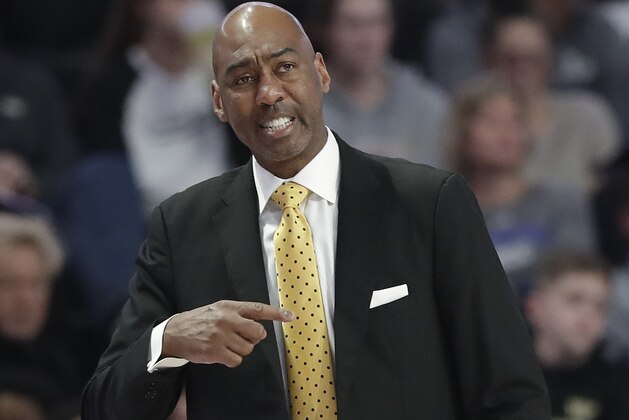 Wake Forest coach Danny Manning directs his team against Duke during the first half of an NCAA college basketball game in Winston-Salem, N.C., Tuesday, Jan. 8, 2019. (AP Photo/Chuck Burton)