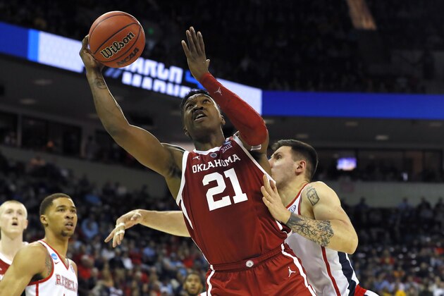 COLUMBIA, SOUTH CAROLINA - MARCH 22: Kristian Doolittle #21 of the Oklahoma Sooners drives to the basket against Dominik Olejniczak #13 of the Mississippi Rebels in the second half during the first round of the 2019 NCAA Men's Basketball Tournament at Colonial Life Arena on March 22, 2019 in Columbia, South Carolina. (Photo by Kevin C. Cox/Getty Images) COLUMBIA, SOUTH CAROLINA - MARCH 22: Kristian Doolittle #21 of the Oklahoma Sooners drives to the basket against Dominik Olejniczak #13 of the Mississippi Rebels in the second half during the first round of the 2019 NCAA Men's Basketball Tournament at Colonial Life Arena on March 22, 2019 in Columbia, South Carolina. (Photo by Kevin C. Cox/Getty Images)