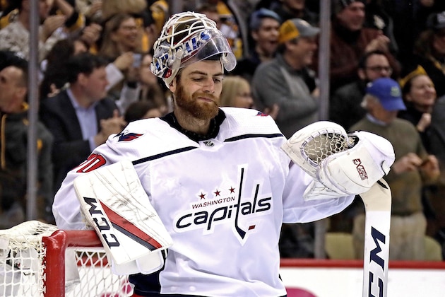 Washington Capitals goaltender Braden Holtby collects himself after allowing a goal by Pittsburgh Penguins' Sidney Crosby in the second period of an NHL hockey game in Pittsburgh, Tuesday, March 12, 2019. The Penguins won 5-3. (AP Photo/Gene J. Puskar)